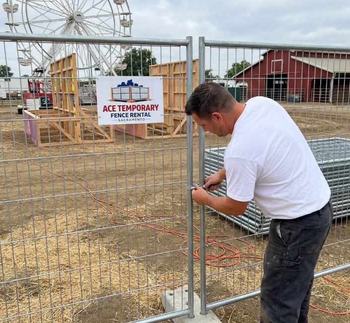 Temporary fence installation on Sacramento construction site